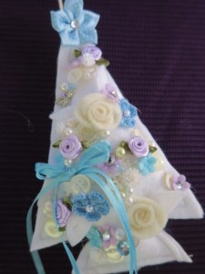 White trees with lots of embellishments.